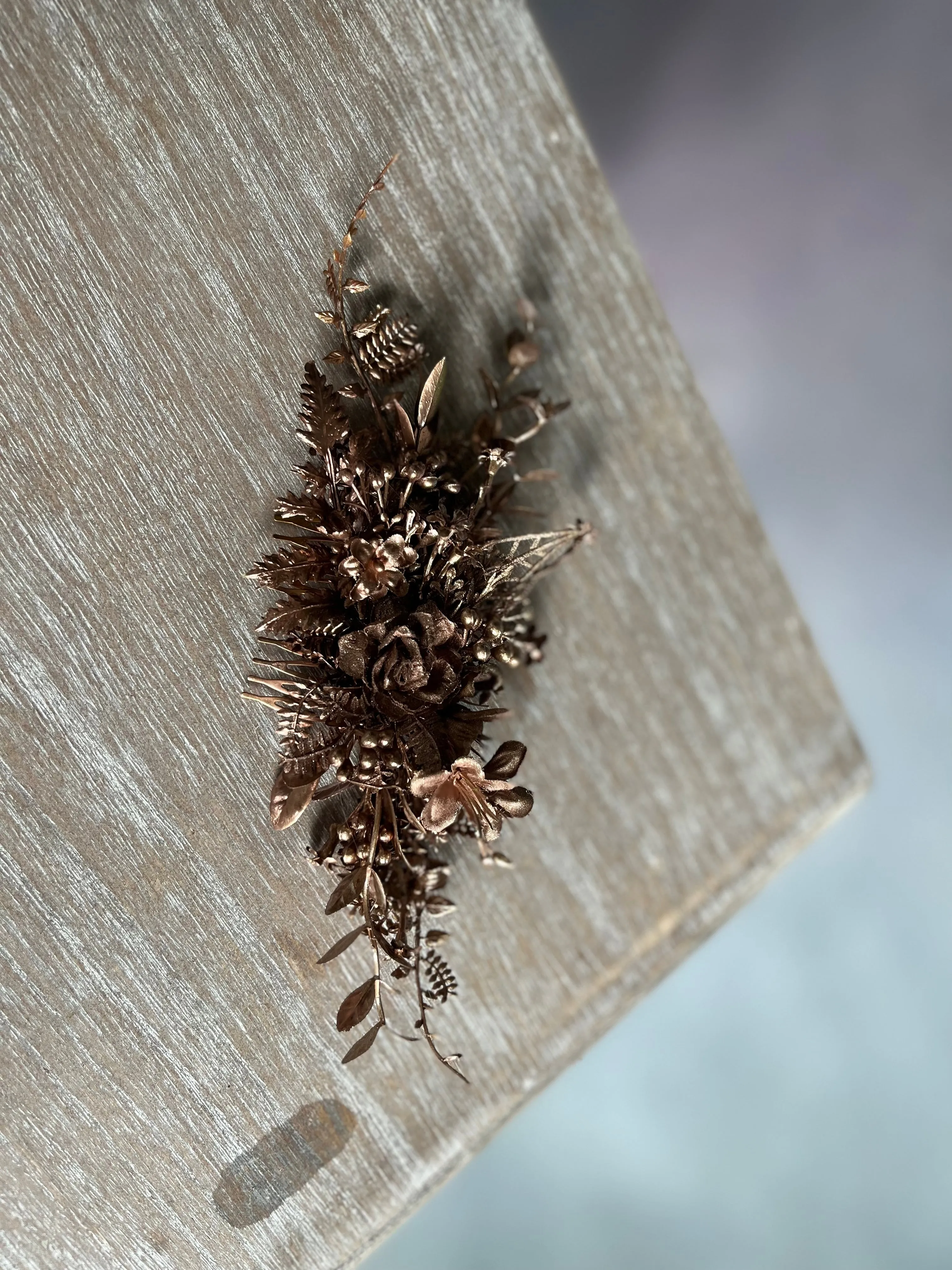 Bronze flower hair comb